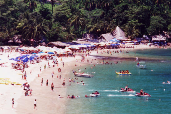 Lots of action at the beach at Playa De Mismaloya, Mexico
